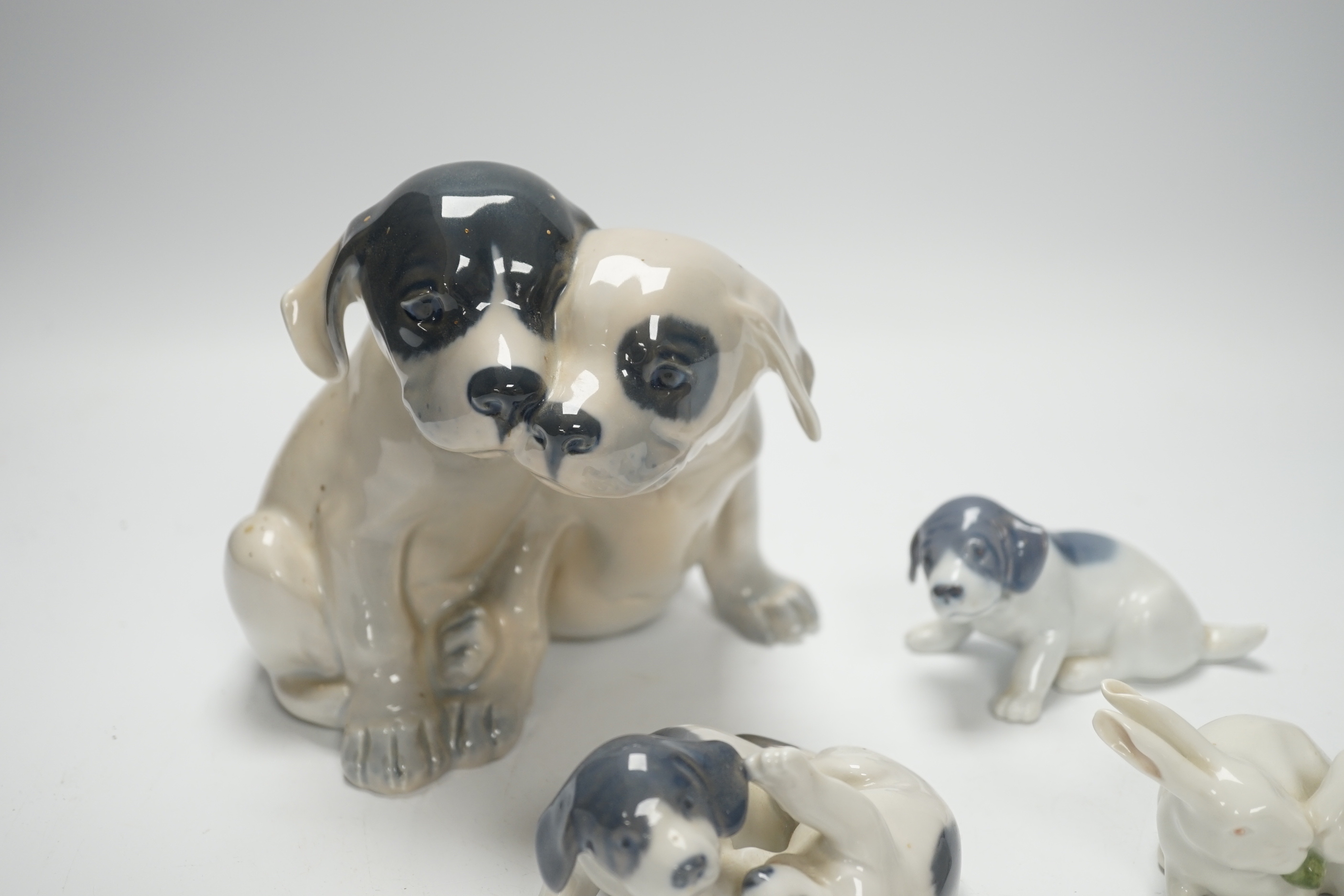 Four Royal Copenhagen animals, dogs and rabbits, tallest 15cm